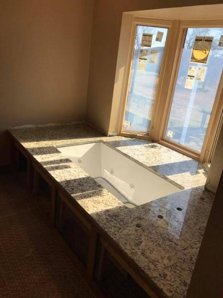 stone bathtub surround