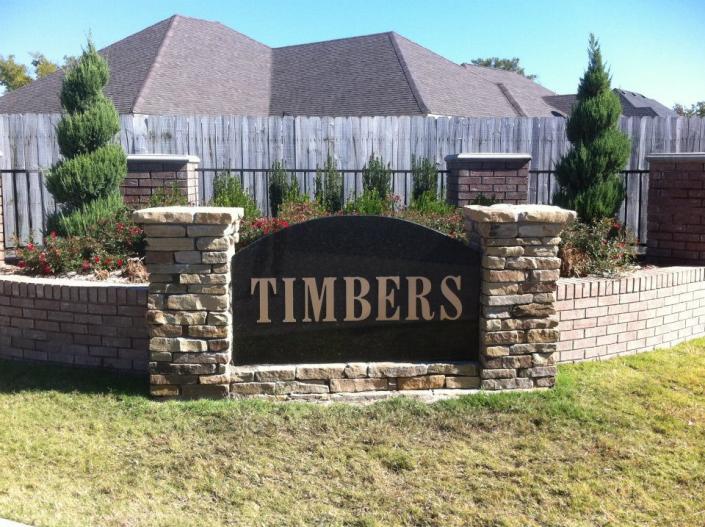 stone neighborhood sign